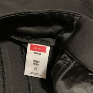 Stretch + extreme skinny mid rise satin pant